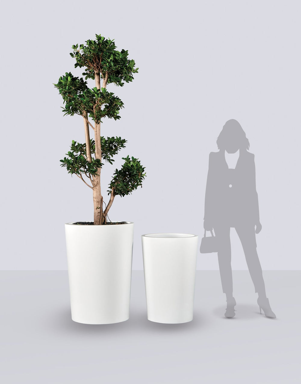 Tegel Round Tapered fiberglass planter size range shown to scale beside a standing figure