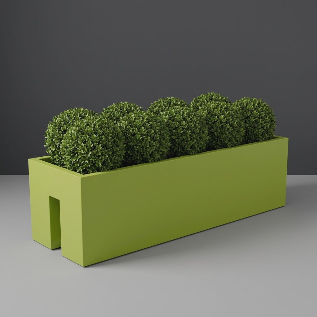 Tiergarden Railing fiberglass planter in Satin Green, planted with row of clipped boxwood balls, studio