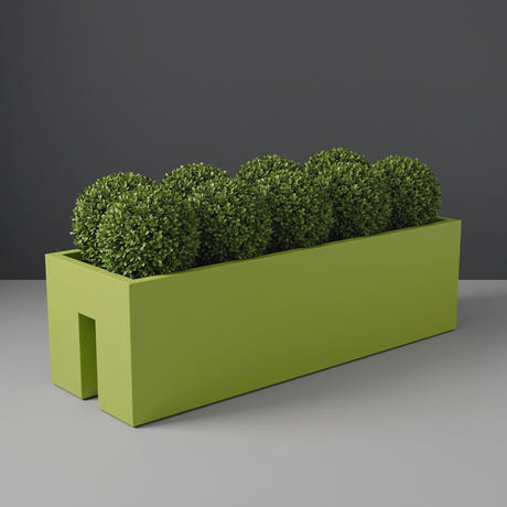 Tiergarden Railing fiberglass planter in Satin Green, planted with row of clipped boxwood balls, studio