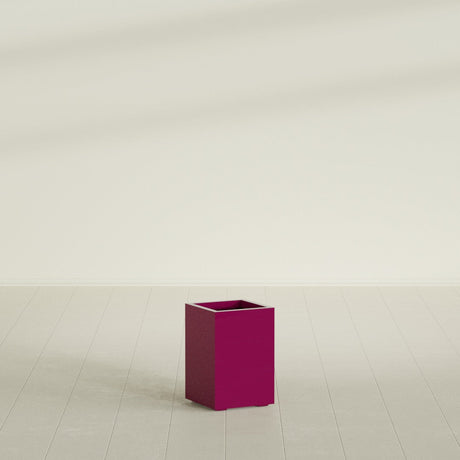 Tolga corner fiberglass planter in Gloss Eggplant