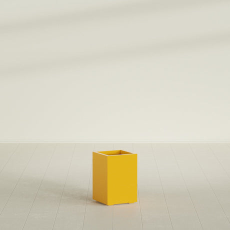 Tolga corner fiberglass planter in Gloss Saffron