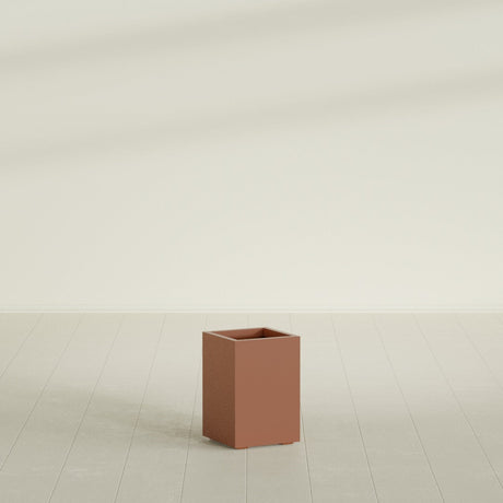 Tolga corner fiberglass planter in Matte Terra Cotta