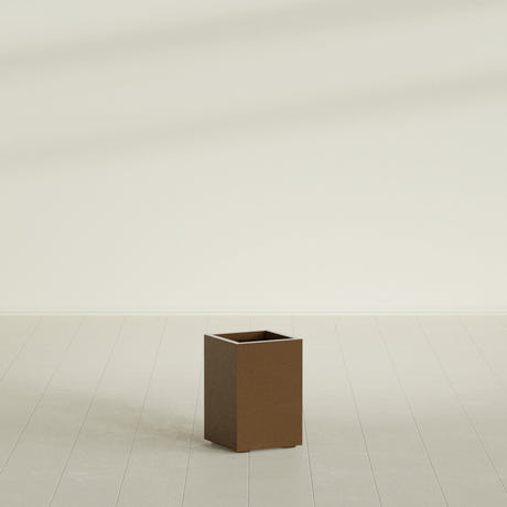 Tolga corner fiberglass planter in Metallic Bronze