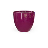 Wannsee round fiberglass planter in Gloss Eggplant, shown empty