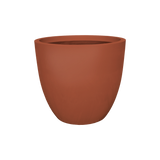 Wannsee round fiberglass planter in Matte Terra Cotta, studio render